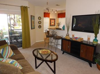 Spacious Living Room With Private Balcony at Berkshire at Citrus Park, Tampa, FL